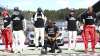 Mercedes driver Lewis Hamilton of Britain, centre, takes a