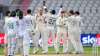 England celebrate the wicket of Shadab Khan of Pakistan on