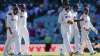 Indian players walk from the field at the close of play on