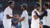 India's Ravichandran Ashwin, left, is congratulated by his