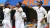 India's Mohammed Siraj, centre, celebrates with teammate