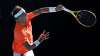 Spain's Rafael Nadal serves to Serbia's Laslo Djere during