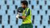 Pakistan's captain Babar Azam raises his helmet to