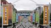 People walk the road to Wembley stadium during the Euro