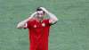 Poland's Robert Lewandowski smiles during training session