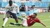 Hungary's Attila Fiola, right, challenges France's Ousmane