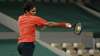 Switzerland's Roger Federer plays a return to Germany's