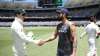 Tim Paine and Virat Kohli