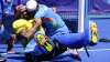 India goalkeeper Sreejesh Parattu Raveendran, left, celebrates with Mandeep Singh 