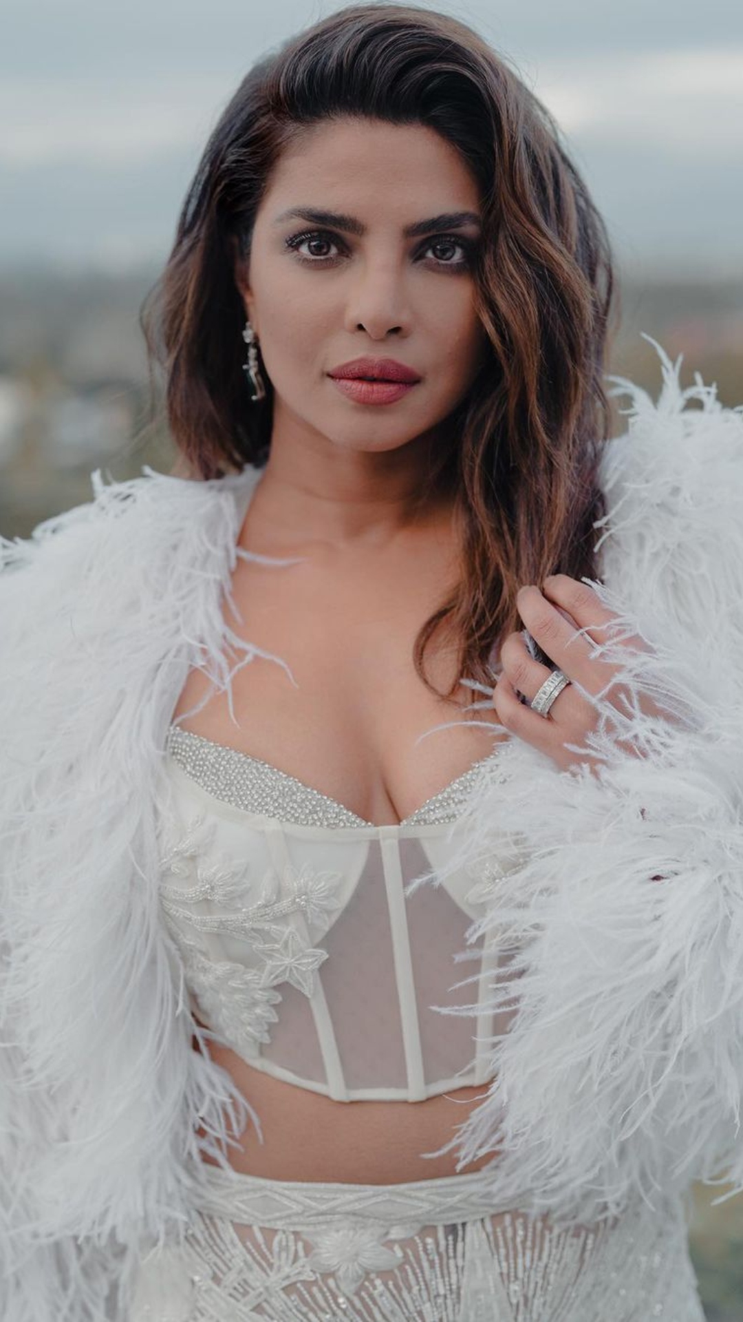 Priyanka Chopra looks breathtaking in a sheer white gown at the Oscars 2023 pre-event
