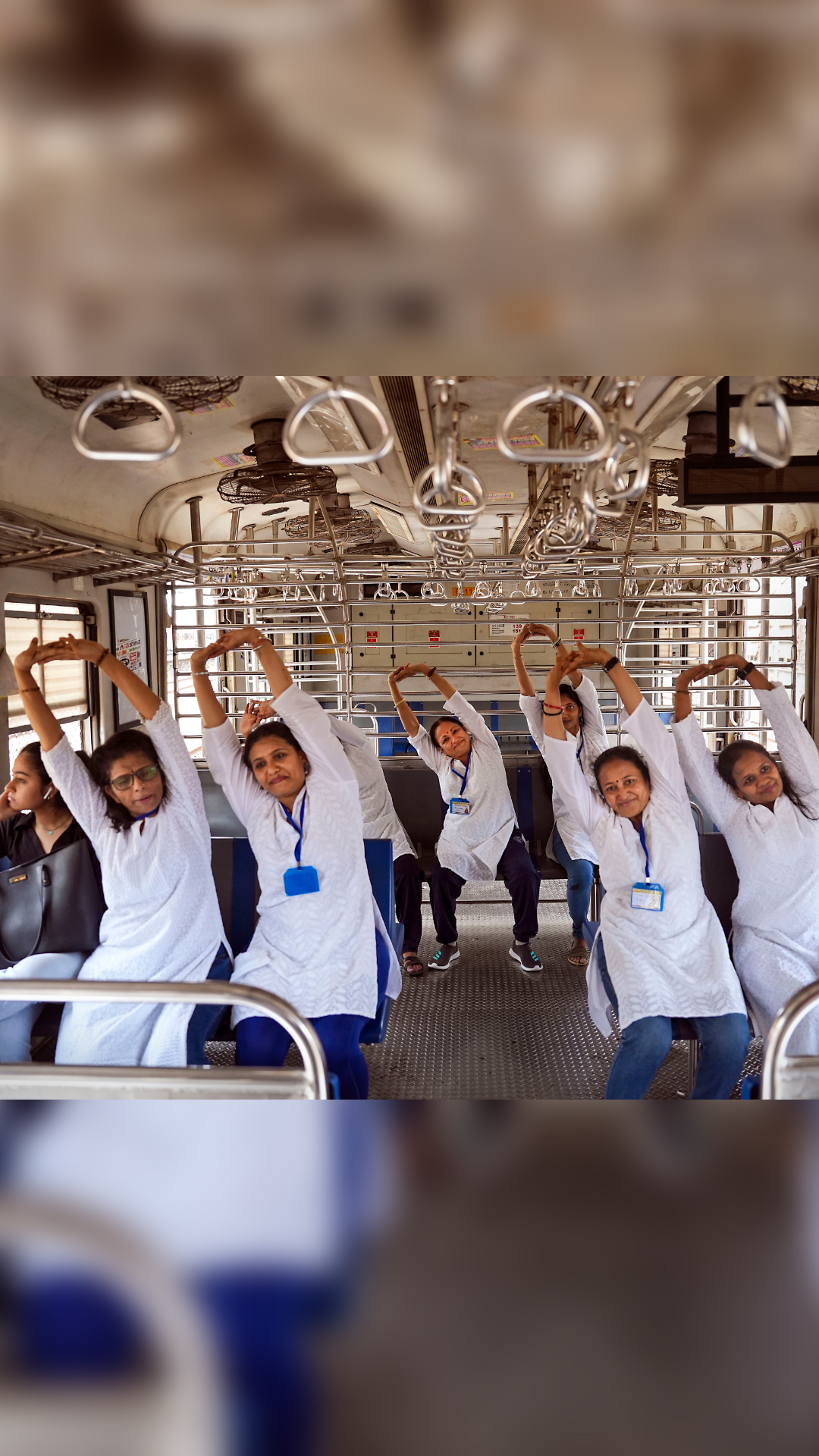 International Yoga Day: Mumbai local train commuters participate in unique celebration