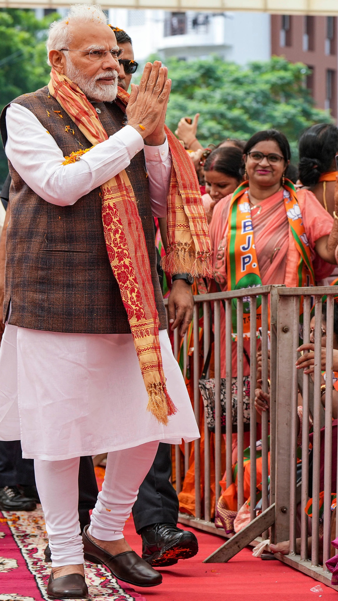 PM Modi greeted by women BJP workers during Nari Shakti Vandan-Abhinandan Karyakram at BJP headquarters in New Delhi