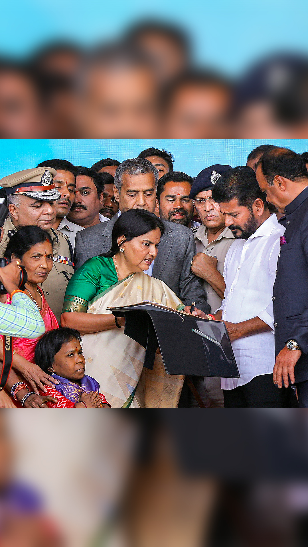 As CM Revanth Reddy signed two files - implementation of six poll &#039;guarantees&#039;, providing a job to a disabled woman  