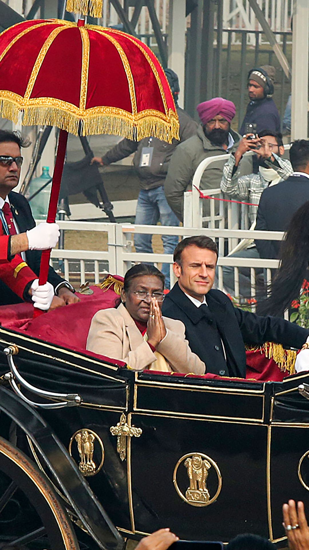 President Murmu with chief guest French President Macron arrives in special presidential carriage for 75th Republic Day ceremony, in New Delhi