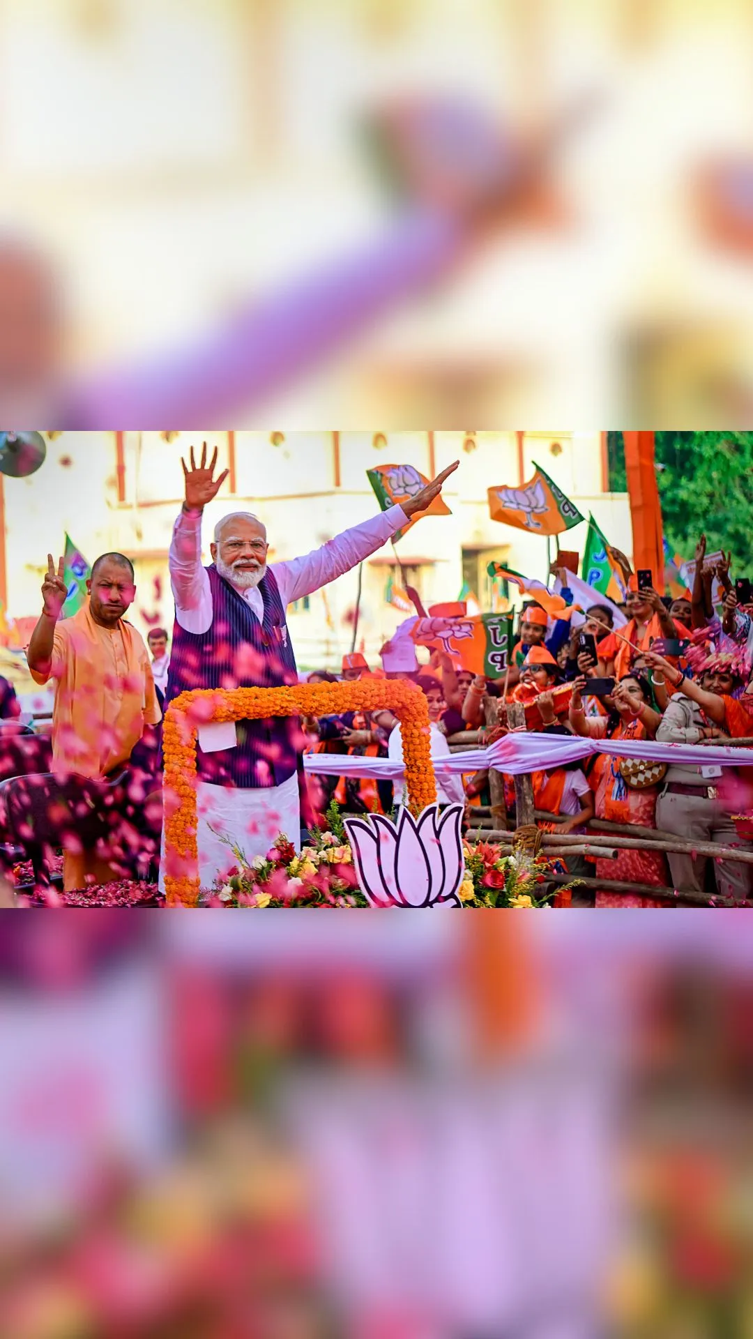 PM Modi, CM Yogi during &quot;Nari Shakti Sammelan&#039; in Varanasi, ahead of seventh phase polling 