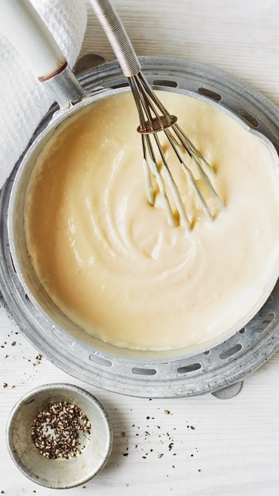 Make the Sauce: Add 1 cup of milk (or any plant-based milk) to the pan. Stir constantly to avoid lumps.