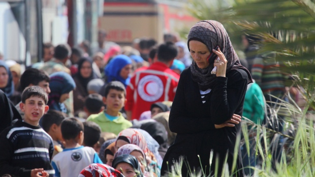 At least 43 killed as blast hits buses evacuating Syrians