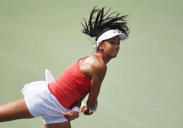 Karman Kaur Thandi in action against Taiwanese tennis player Ya Hsuan Lee