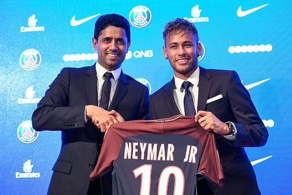 Brazilian football star Neymar, or Neymar Jr., poses as he arrives