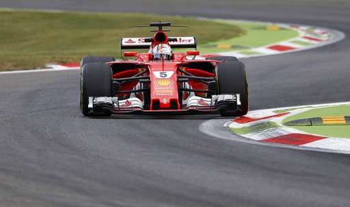 Sebastian Vettel steers his Ferrari during the second practice session at Monza