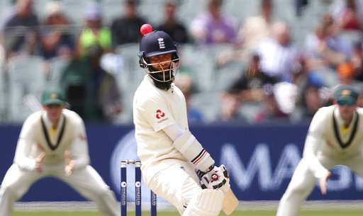Moeen Ali has the ball fly by his head while batting against Australia during the third day of their Ashes Test in Adelaide 