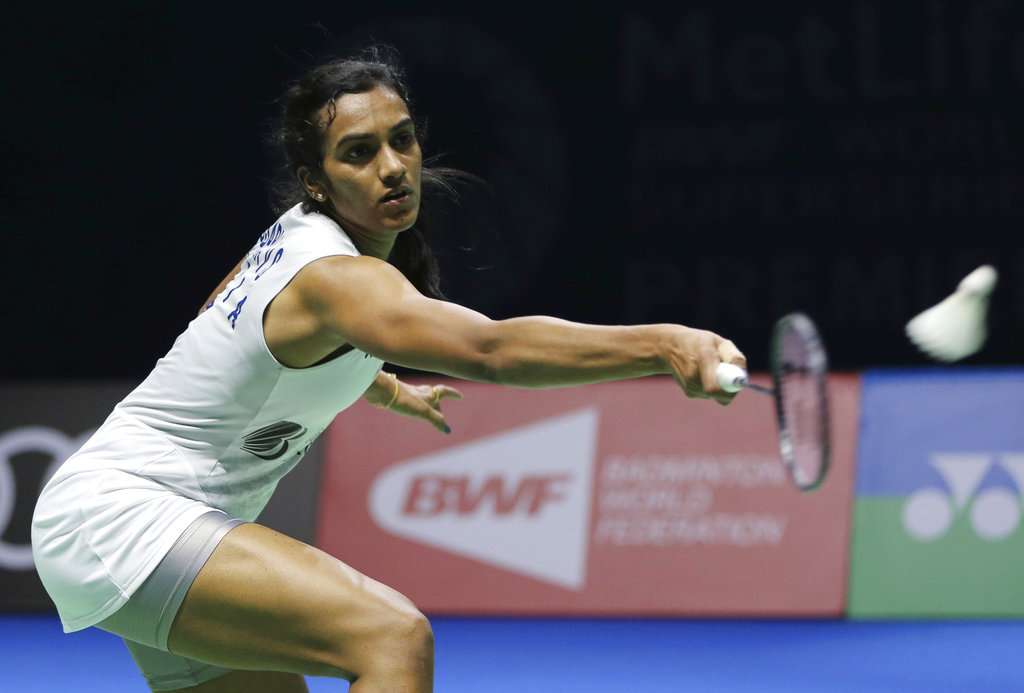 PV Sindhu returns a shot to Japan's Yamaguchi during the final of the Dubai World Superseries on Sunday