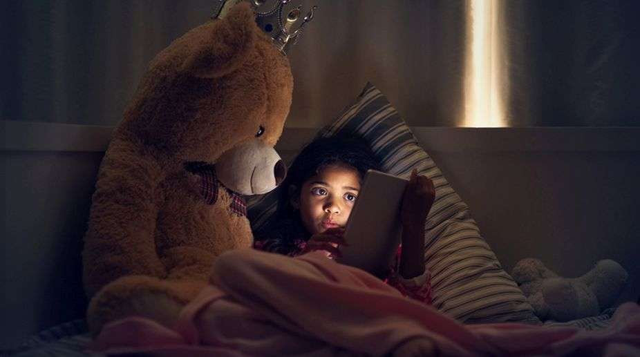 Kids now spend 30 minutes more every day on digital screens