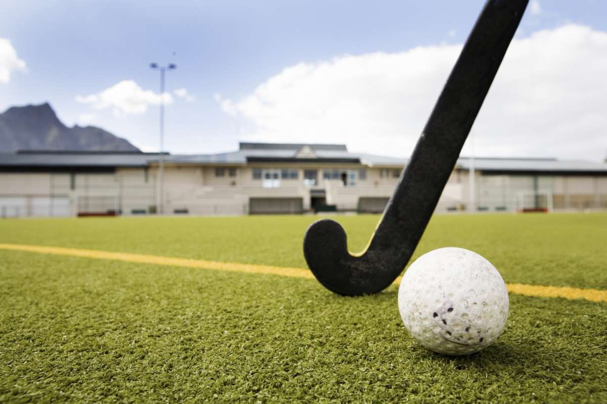 A file image of a hockey stick and ball.