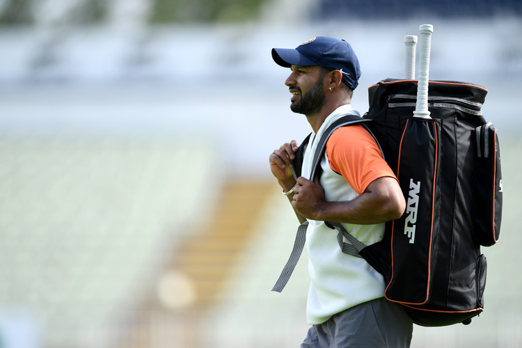 Shikhar Dhawan's place in the Test team is uncertain after a poor outing against Essex.
