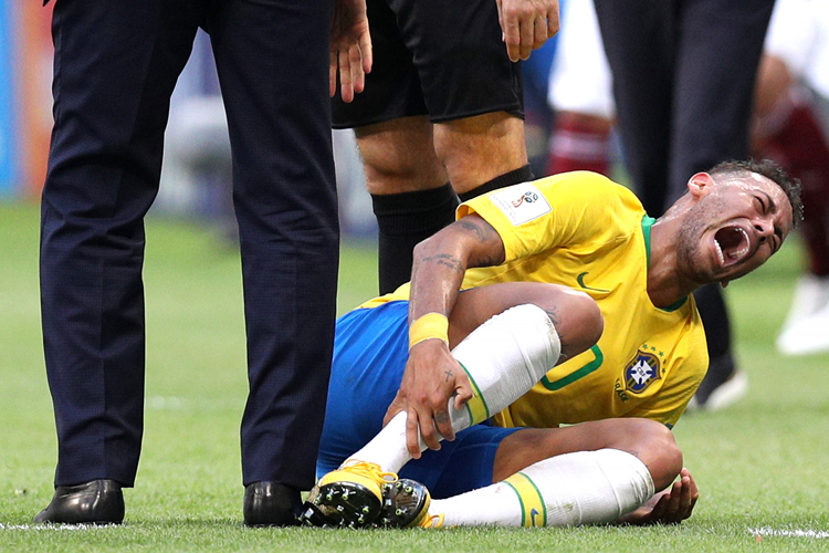 &nbsp;Neymar Jr. of Brazil goes down injured during the Round of 16 match against Mexico.
