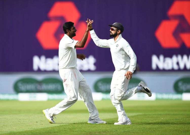 Ravichandran Ashwin celebrates a wicket with Indian skipper Virat Kohli