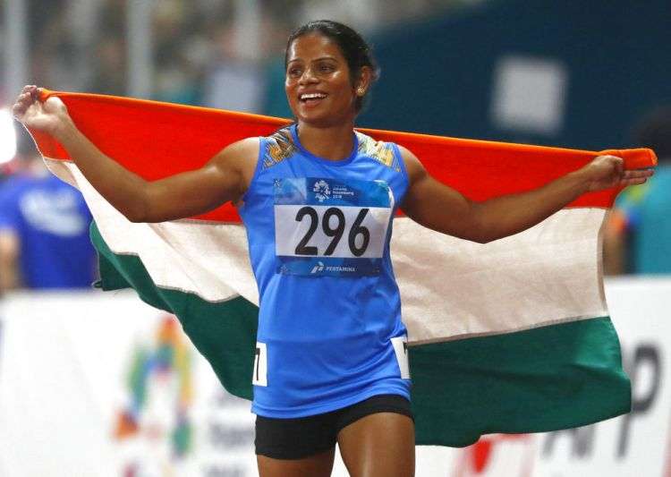 Dutee Chand celebrates after winning the silver medal