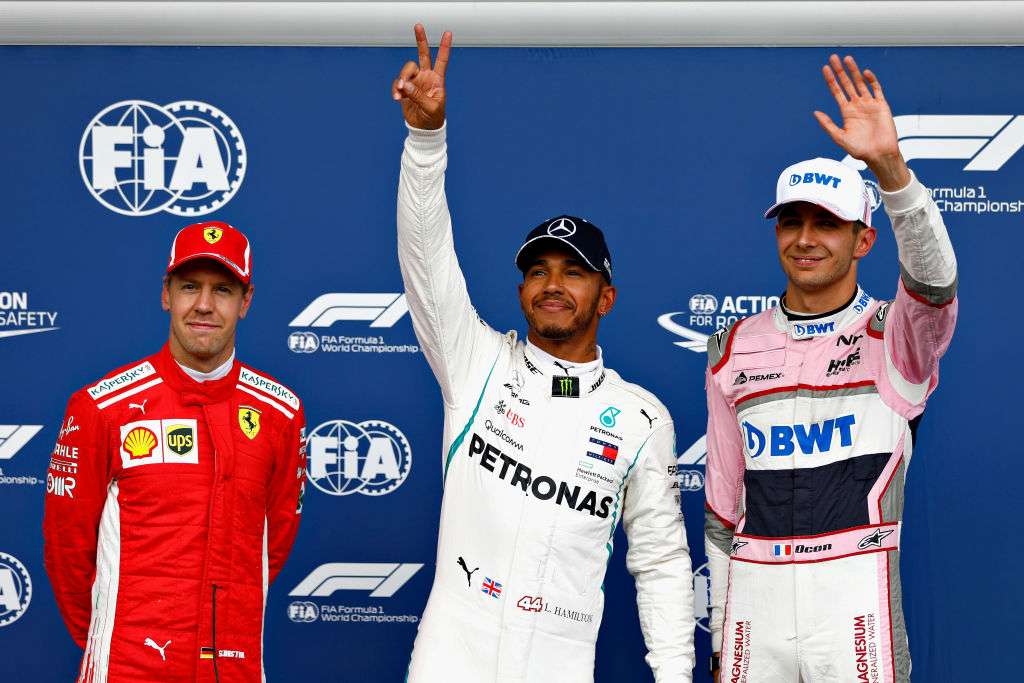 Lewis Hamilton masters rain to take pole position for Belgian GP