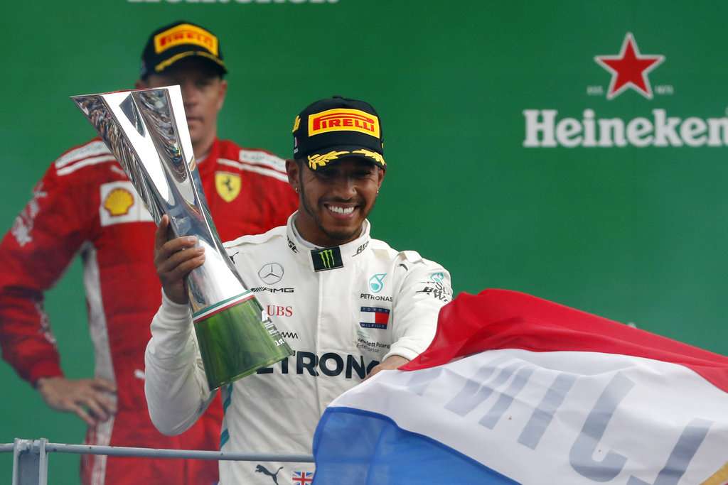 Mercedes' Lewis Hamilton edges Ferrari to win Italian GP, extends lead