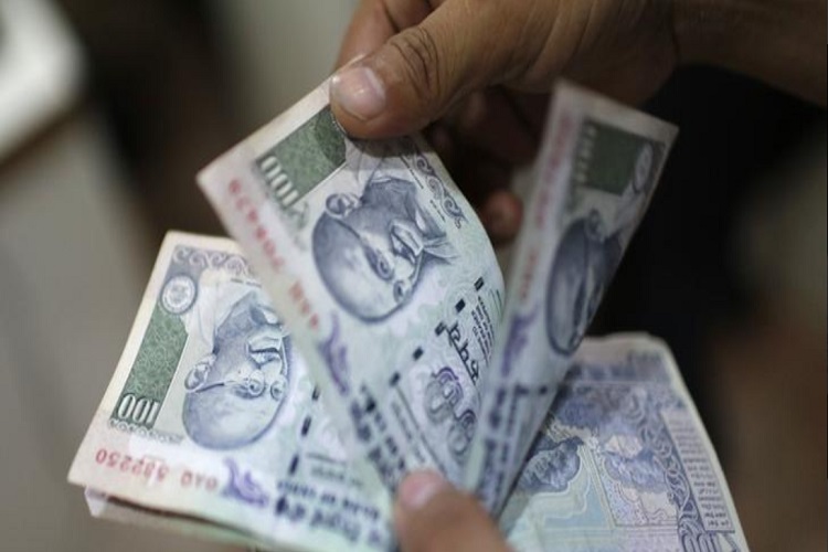 Rupee continues to depreciate, hits fresh record low of 72.69 versus US dollar