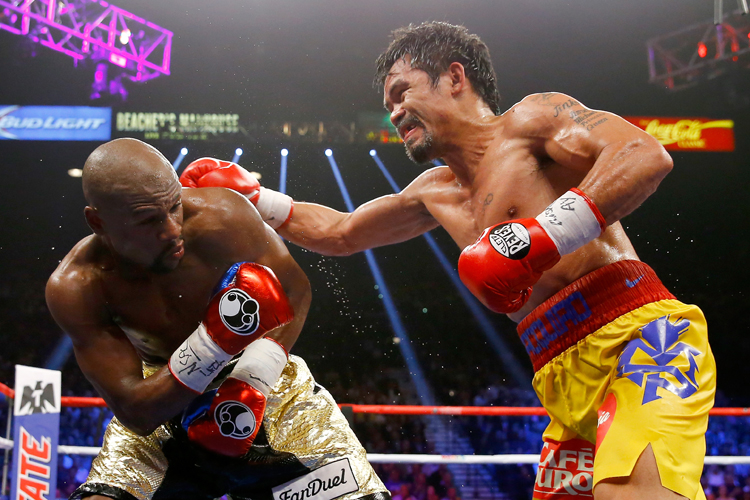 Manny Pacquiao challenges Floyd Mayweather for a rematch of the 'fight of the century'