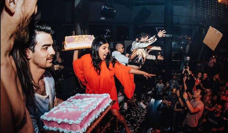 Priyanka Chopra, Nick Jonas throw cakes on crowd at a concert. Watch video