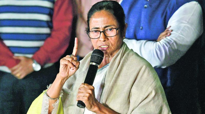 BJP tryin to gain pol advantage by using religion : Mamata