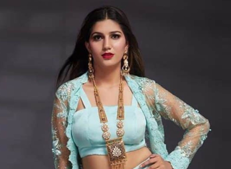 Sapna Choudhary Latest News: Haryanvi sensation dazzles in white suit and red lipstick, check viral videos