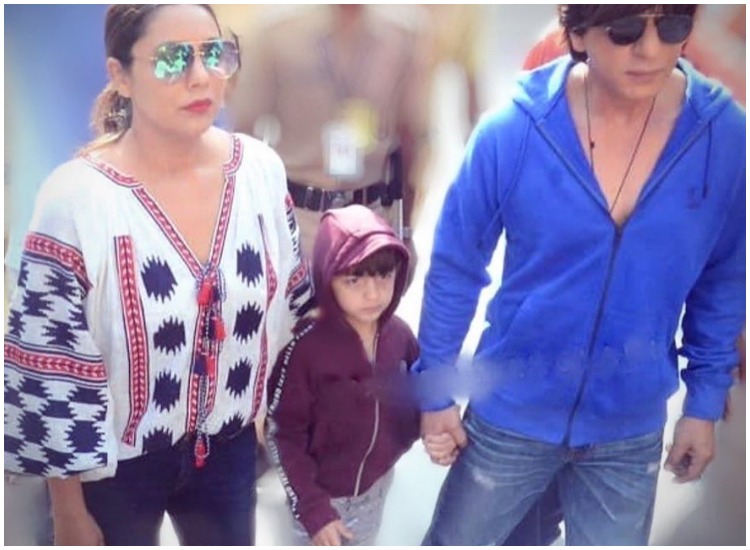 Little AbRam tags along father Shah Rukh Khan and mother Gauri as they ...