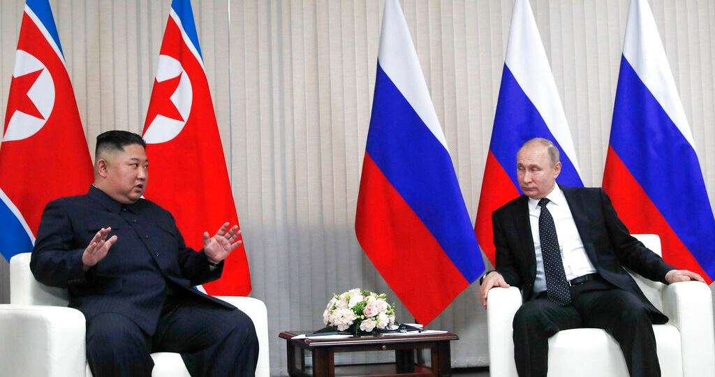 At Kim-Putin summit, hearty handshakes and manspreading – India TV