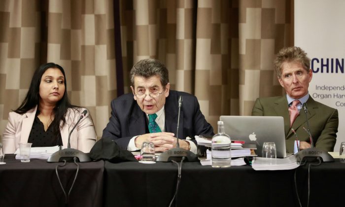 Tribunal panel member Regina Paulose (L), chair to the tribunal Geoffrey Nice QC (C), panel member Nicholas Vetch on the first of the April hearings in London on April 6, 2019.&nbsp;