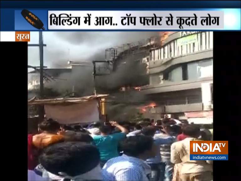 VIDEO: Horrific scenes of students jumping off Surat building to save ...