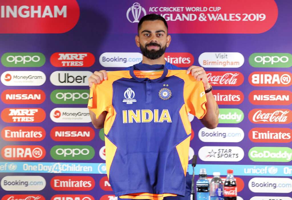 virat kohli orange jersey