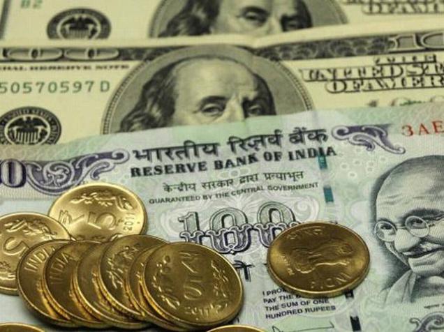 Rupee settles 21 paise higher at 69.15 to US dollar