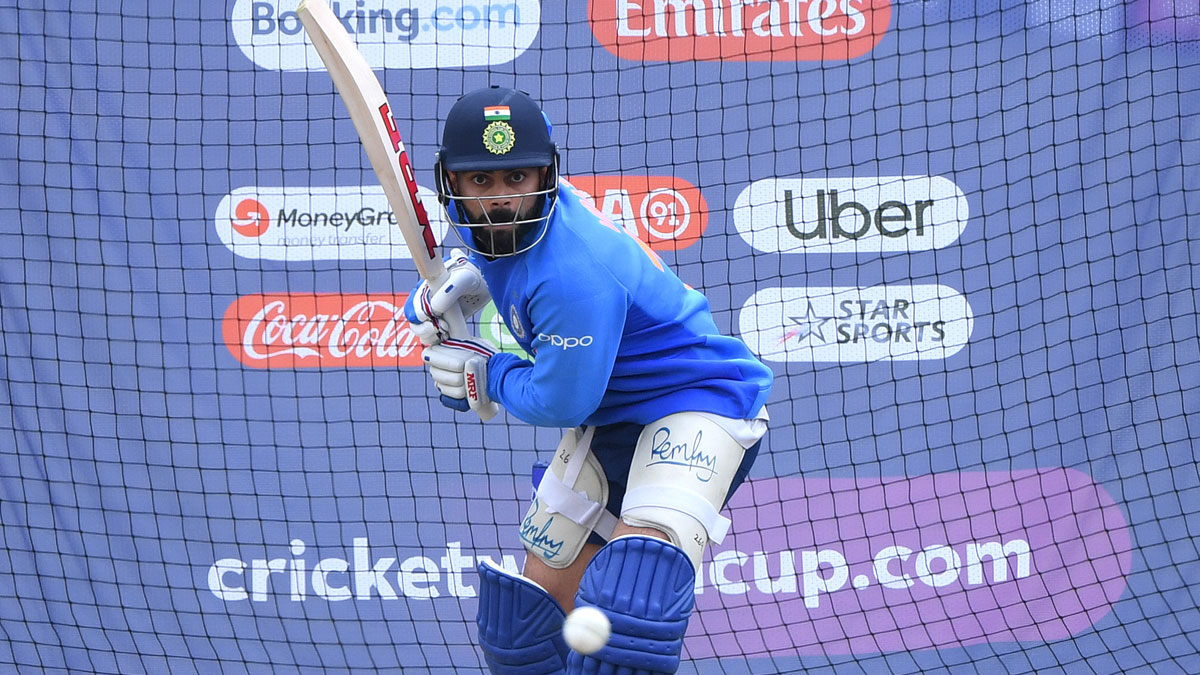 Virat Kohli takes the Bottle Cap challenge with coach Ravi Shastri doing the commentary job