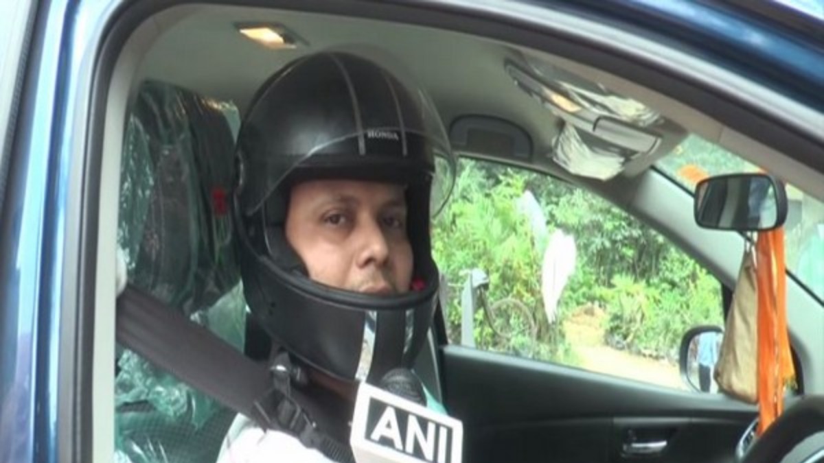 Man wears helmet while driving his car, here's why