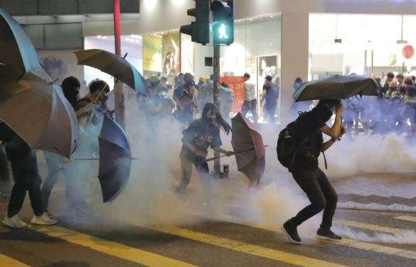 Hong Kong protesters vandalize subway station, storm mall