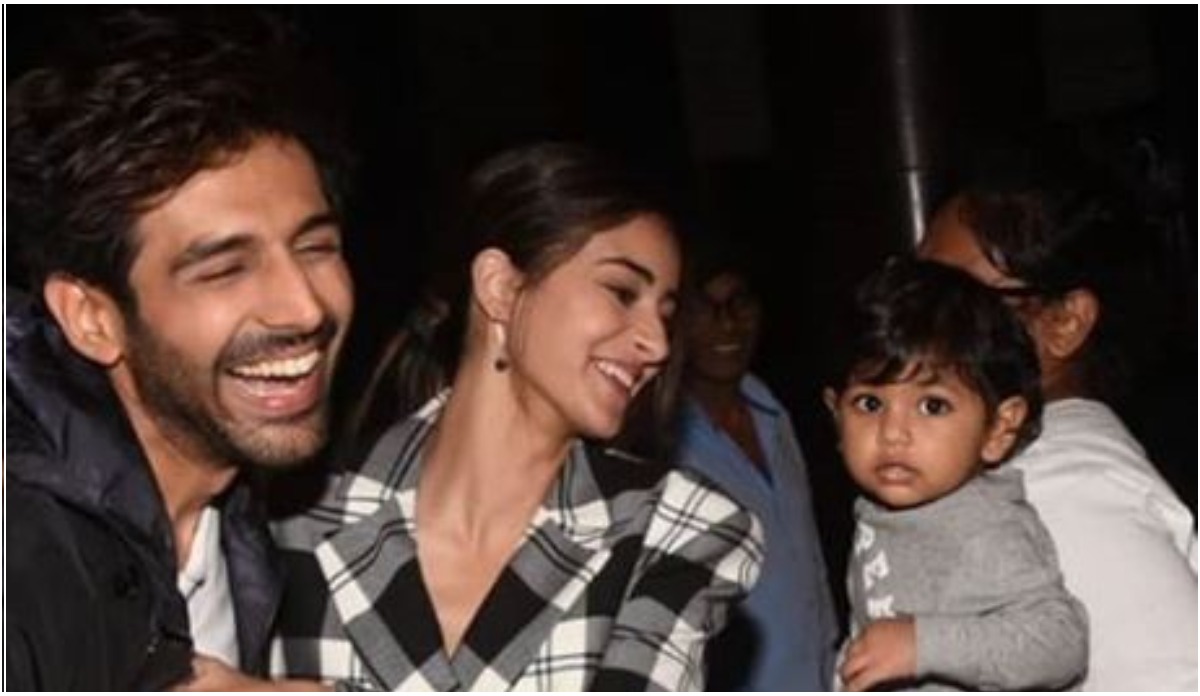 Kartik Aaryan and Ananya Panday trying to impress this munchkin are all of us. Watch video