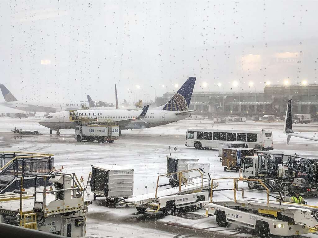 Snowfall in Midwest: Plane skids off runway during landing at Chicago's airport